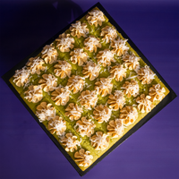 Square pandan gula melaka cake bites viewed from above, portioned for sharing — Elevete Patisserie