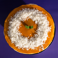 The Locale pandan gula melaka cake from above, coconut-topped — Elevete Patisserie