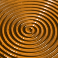 Macro of the piped coffee-caramel spiral on the pandan coffee tart — Elevete Patisserie