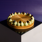 Pandan coffee tart with a piped caramel-coffee spiral and pandan cream peaks — Elevete Patisserie